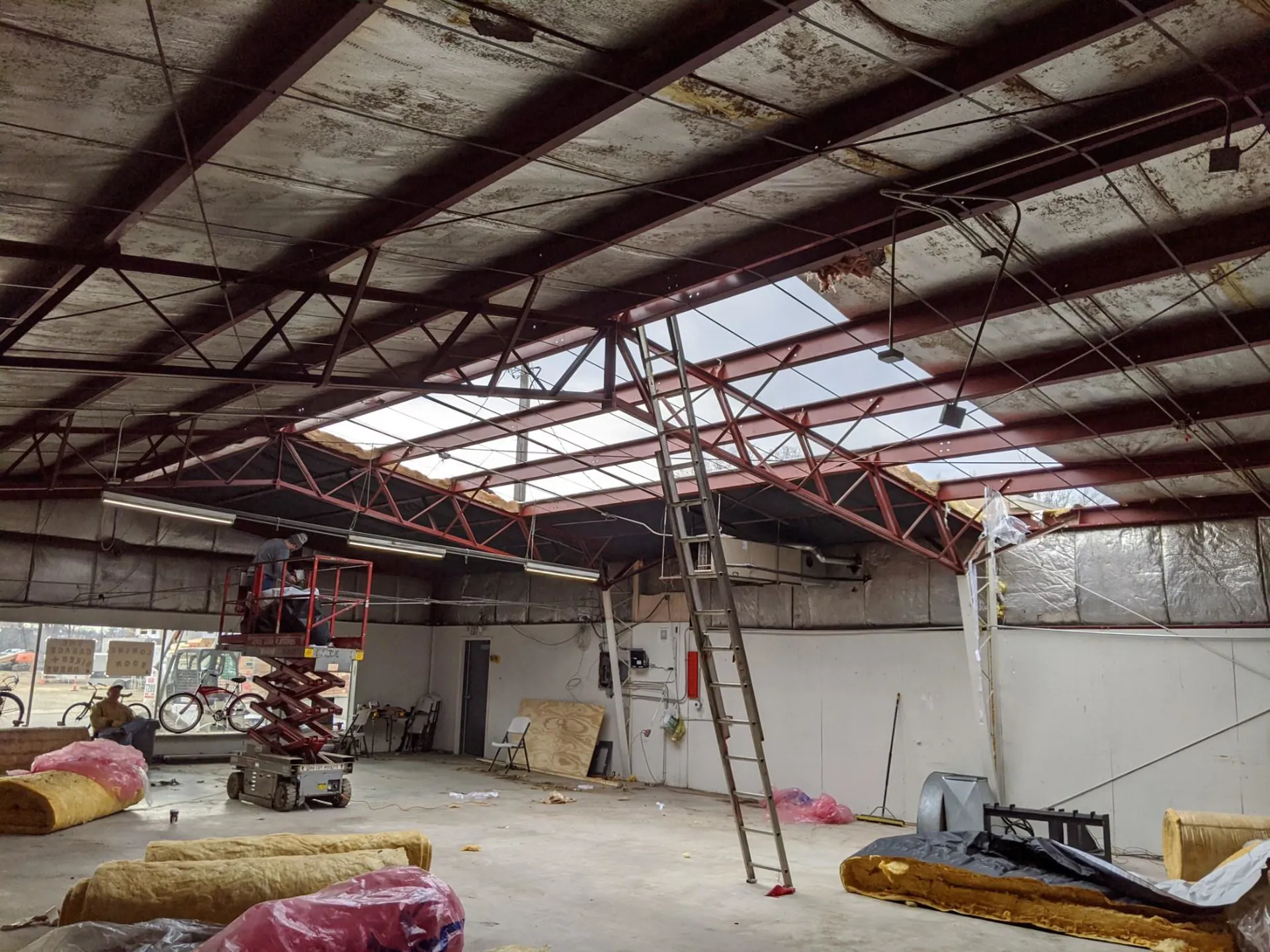 Empty unit with equipment and plans during fit-out