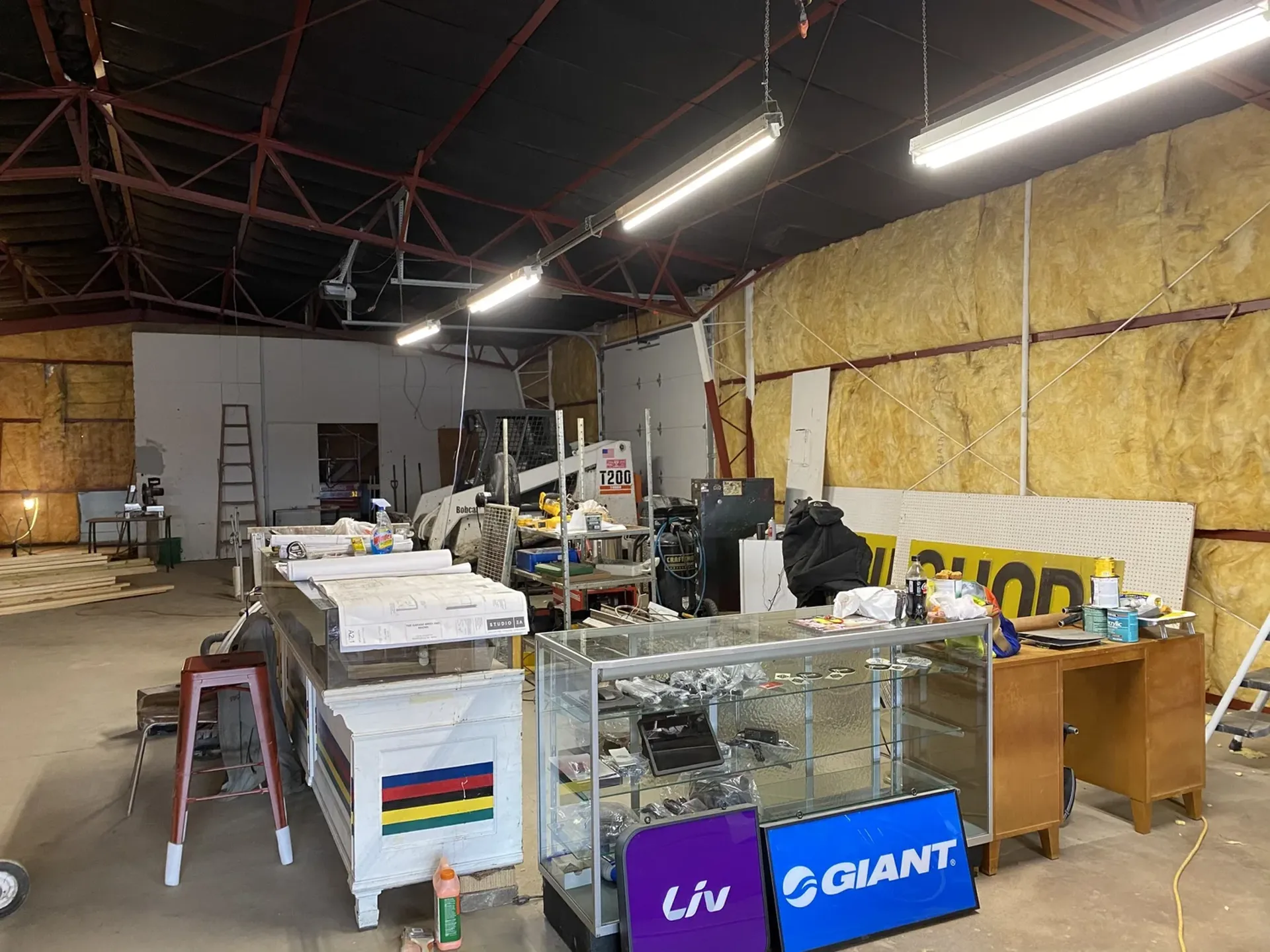 Contractors installing the front door near completion